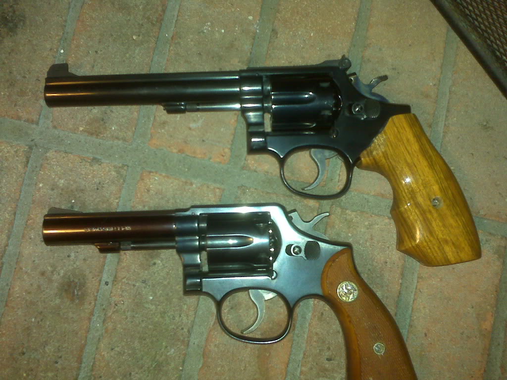 A Smith & Wesson Model 10 and Model 14 revolver shown side by side