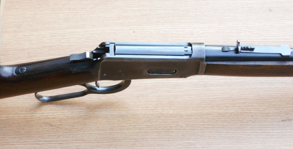 Close-up of a Winchester Model 94's open receiver and lever action