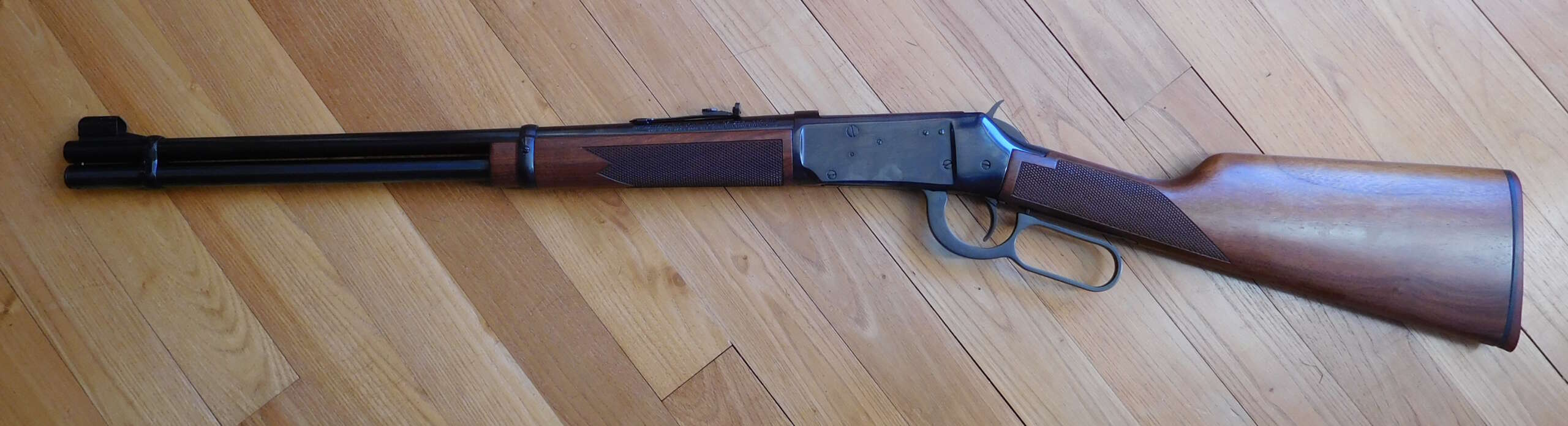 A Winchester 94XTR Big Bore rifle with checkered stock, chambered in .375 Winchester